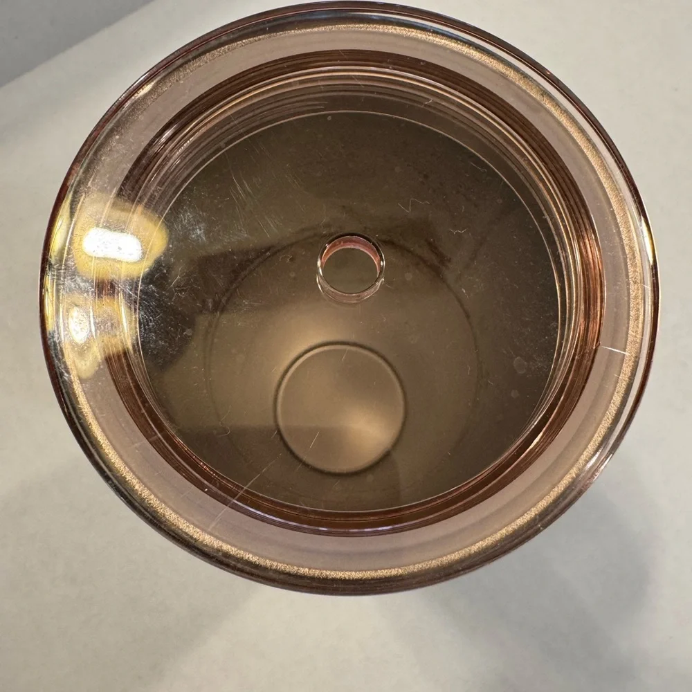 Starbucks Copper colored tumbler that transitions to a black bottom
